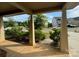 Inviting front porch with neutral-colored columns and a view of the neighborhood at 145 W Morehouse Ave, Mooresville, NC 28117