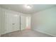 Bedroom features carpeted floors and a closet with double doors at 14505 Rhodes Hall Dr, Charlotte, NC 28273