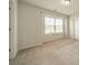 Neutral bedroom with carpet, a large window, and white trim for a serene and comfortable space at 14505 Rhodes Hall Dr, Charlotte, NC 28273