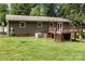 Exterior view of home with deck, backyard and trees at 146 Duff St, Gastonia, NC 29715