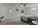 Bright bedroom with a large window, ceiling fan and neutral decor at 146 Duff St, Gastonia, NC 29715