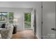 Bright foyer showcasing hardwood floors and a view of the outdoors through the front door at 146 Duff St, Gastonia, NC 29715