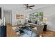 Sunlit living room featuring wood floors, white walls, and stylish furniture at 146 Duff St, Gastonia, NC 29715