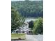 Scenic view of marina, perfect for boating enthusiasts and waterfront relaxation at 207 Cardinal Dr, New London, NC 28127