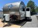 Navigation RV with sleek gray exterior, parked on paved lot at 207 Cardinal Dr, New London, NC 28127