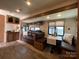 Comfortable RV living room features a sofa, cabinets, and a dining area, perfect for relaxation and entertainment at 207 Cardinal Dr, New London, NC 28127