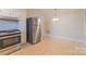 Bright kitchen featuring stainless steel appliances and ample counter space at 208 S Thompson St, Monroe, NC 28112