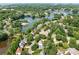 Aerial view of a beautiful lake community with homes and boat slips at 21218 Baltic Dr, Cornelius, NC 28031