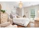 Charming bedroom with chandelier, tapestry, and decorative pillows at 21218 Baltic Dr, Cornelius, NC 28031