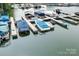 Overhead shot of a marina with covered boat slips at Lake Norman at 21218 Baltic Dr, Cornelius, NC 28031
