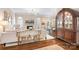 Elegant living room with hardwood floors, fireplace, and stylish furnishings at 21218 Baltic Dr, Cornelius, NC 28031