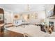 Bright living room featuring hardwood floors, plush seating, and ample natural light at 21218 Baltic Dr, Cornelius, NC 28031