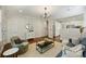 Living room with lots of natural light, neutral decor, and an open floor plan at 2223 Club Rd, Charlotte, NC 28205