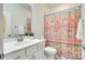 Bathroom with a vanity and colorful shower curtain at 2261 Lincolnshire Ln, Waxhaw, NC 28173