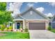 Charming home featuring a two-car garage, well-manicured lawn, and tasteful landscaping for curb appeal at 2261 Lincolnshire Ln, Waxhaw, NC 28173