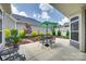 A lovely patio with table, chairs, and umbrella, great for outdoor dining and relaxing at 2261 Lincolnshire Ln, Waxhaw, NC 28173