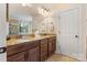 Bathroom featuring double vanities, granite countertops, and a neutral color scheme at 274 Cove Creek Loop, Mooresville, NC 28117