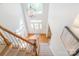 Bright and airy foyer with a view of the front door and staircase, featuring a light fixture at 3112 Planters Ridge Rd, Charlotte, NC 28270