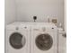 Efficient laundry room with modern washer and dryer at 3112 Planters Ridge Rd, Charlotte, NC 28270