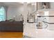 Open concept living room with white countertops and an gray cabinet at 3112 Planters Ridge Rd, Charlotte, NC 28270