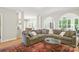 Spacious living room with an open floor plan and seamless flow to adjacent rooms at 3112 Planters Ridge Rd, Charlotte, NC 28270