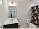 Functional bathroom featuring a single vanity and shower with patterned curtain at 3609 Benseval Ln, Matthews, NC 28105