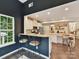 Stylish kitchen with granite countertops, modern appliances, breakfast bar, and hardwood flooring at 3609 Benseval Ln, Matthews, NC 28105