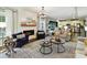 Inviting living room featuring a fireplace, comfortable seating, and an open layout to the kitchen at 3609 Benseval Ln, Matthews, NC 28105