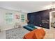 Inviting playroom with a chalkboard wall and comfortable seating for Gathering fun at 3609 Benseval Ln, Matthews, NC 28105