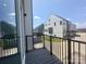 View from the balcony showcasing the neighborhood, offering serene outdoor living space at 3618 S Tryon St # 19, Charlotte, NC 28217