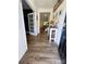 Inviting foyer with sleek wooden flooring and tasteful decor leads into the living space at 3816 Rosewood Dr, Mount Holly, NC 28120
