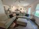 Open-concept living room showing modern decor connecting seamlessly to the kitchen and dining areas at 3816 Rosewood Dr, Mount Holly, NC 28120