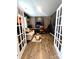 Comfortable home office with hardwood floors, a stylish workstation, and cozy seating at 3816 Rosewood Dr, Mount Holly, NC 28120