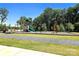 Community playground featuring modern equipment and a safe, cushioned surface for children to enjoy at 3816 Rosewood Dr, Mount Holly, NC 28120
