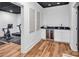 Basement featuring a workout area and kitchenette with a wine fridge at 394 Stonecliff Ln, Clover, SC 29710