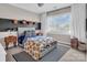 Bright bedroom featuring stylish decor, natural light, and whimsical animal accents, creating a fun and inviting space at 394 Stonecliff Ln, Clover, SC 29710