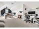 Large, well-lit bonus room with a gaming zone, perfect for recreation and entertainment at 394 Stonecliff Ln, Clover, SC 29710