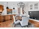Dining area with a round table, stylish decor, and seamless transition to the adjacent kitchen at 394 Stonecliff Ln, Clover, SC 29710