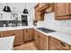 Stylish kitchen featuring custom cabinetry, stainless steel appliances, and a view into the dining area at 394 Stonecliff Ln, Clover, SC 29710