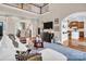 Open-concept living room offering hardwood floors and easy access to the dining and kitchen areas at 394 Stonecliff Ln, Clover, SC 29710