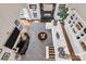 Aerial view of cozy living room showcasing fireplace, built-in shelving, and comfortable seating at 394 Stonecliff Ln, Clover, SC 29710