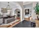 Open-concept with hardwood floors, arched entryways, and a fireplace at 394 Stonecliff Ln, Clover, SC 29710