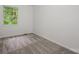 Bedroom with new carpet, white walls, base trim and view to outside trees at 3941 Briarhill Dr, Charlotte, NC 28215