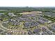 Aerial view of the neighborhood and nearby cityscape, with a community pool at 4008 Yucca Aly, Charlotte, NC 28217