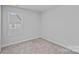 Bedroom featuring neutral carpeting, and a window providing natural light at 4008 Yucca Aly, Charlotte, NC 28217