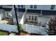 Aerial view of a fenced backyard with a patio area and well-maintained landscaping at 4151 Town Center Rd, Harrisburg, NC 28075