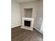 Cozy fireplace features a modern design with a marble mantel and hearth at 4151 Town Center Rd, Harrisburg, NC 28075