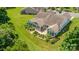 Rear exterior featuring a lovely patio, sunroom, and landscaped backyard at 4208 Rosy Billed Ct # 30, Fort Mill, SC 29707