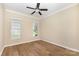 Empty room featuring hardwood floors, a ceiling fan, crown molding and windows for plenty of natural light at 4208 Rosy Billed Ct # 30, Fort Mill, SC 29707