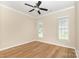 Empty room featuring hardwood floors, a ceiling fan, crown molding and windows for plenty of natural light at 4208 Rosy Billed Ct # 30, Fort Mill, SC 29707